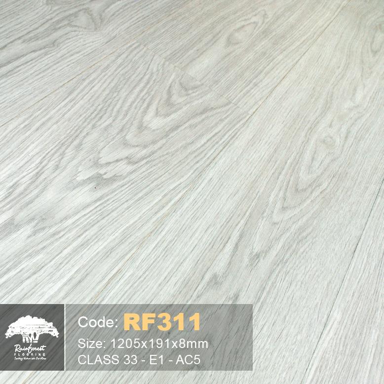 Sàn gỗ Rain Forest 8mm thi công thực tế phòng khách tại TP.HCM