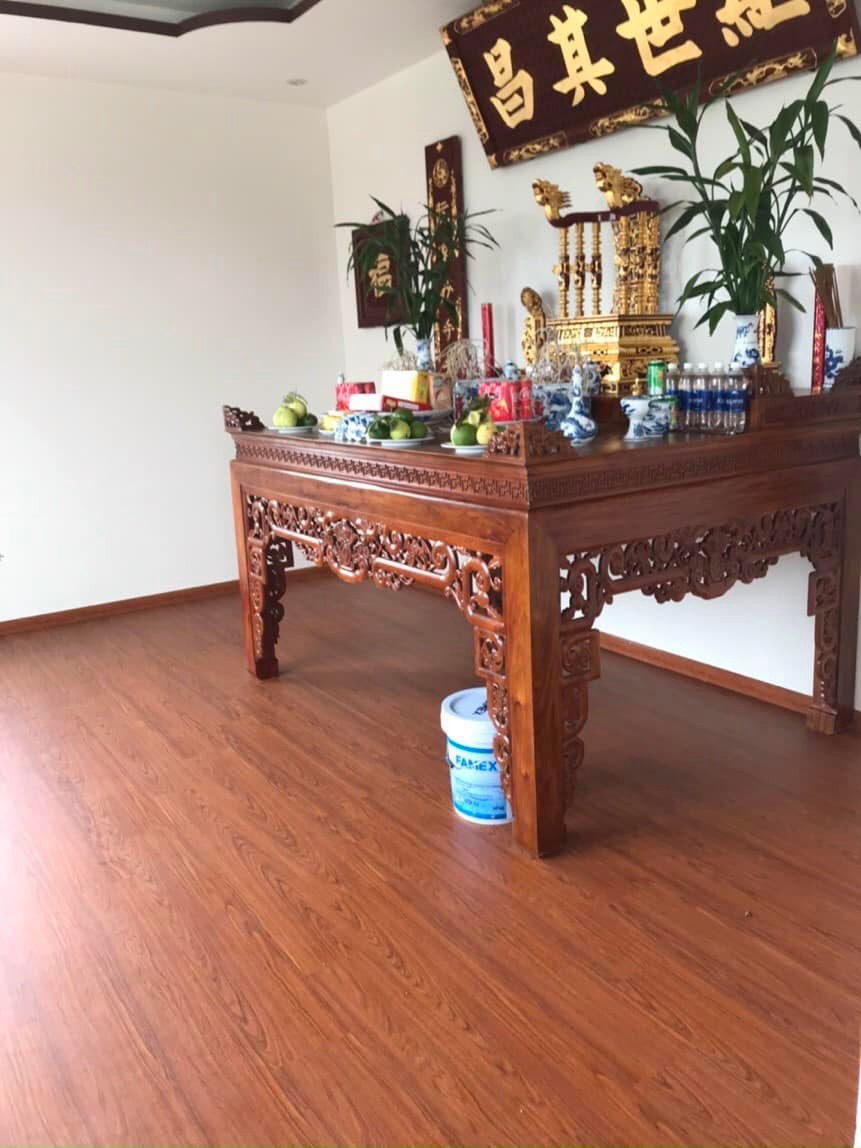 Thi công lát sàn gỗ Hillman 8mm phòng khách căn hộ TPHCM